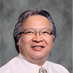 Curtis Yarlott (Apsáalooke)